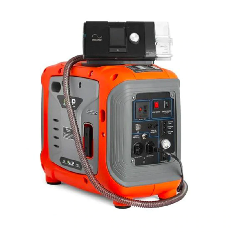ALP Portable 100W Propane Generator Orange and Gray with a radio plugged in