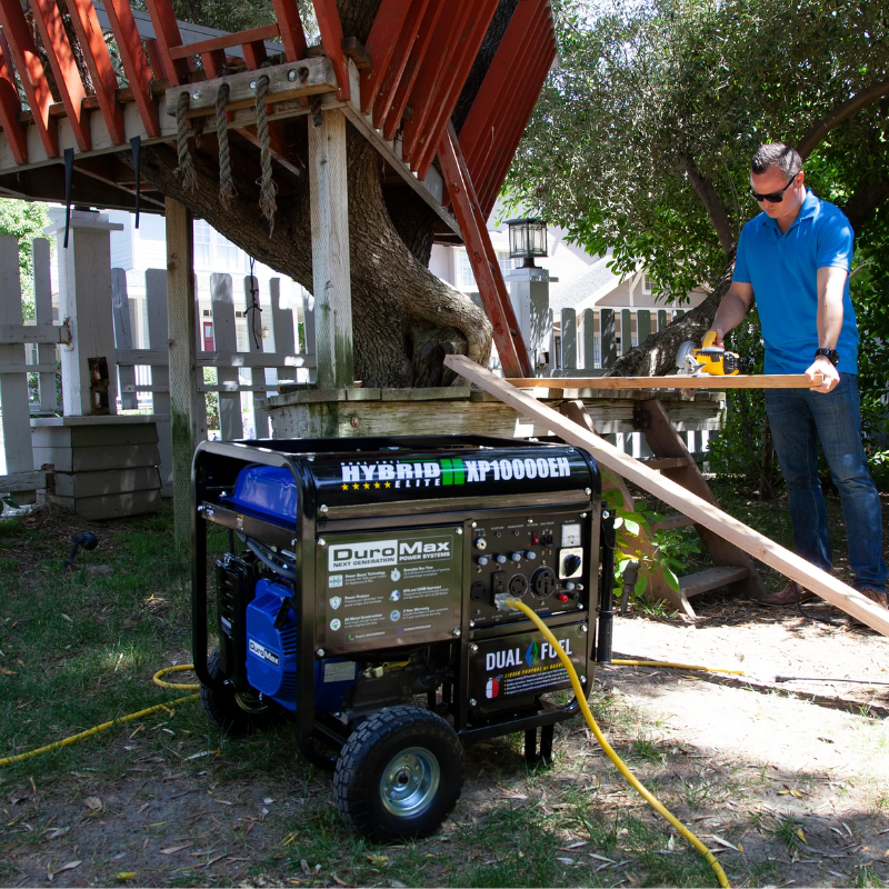 The DuroMax 10000 Watt Dual Fuel Portable Generator in use outdoors