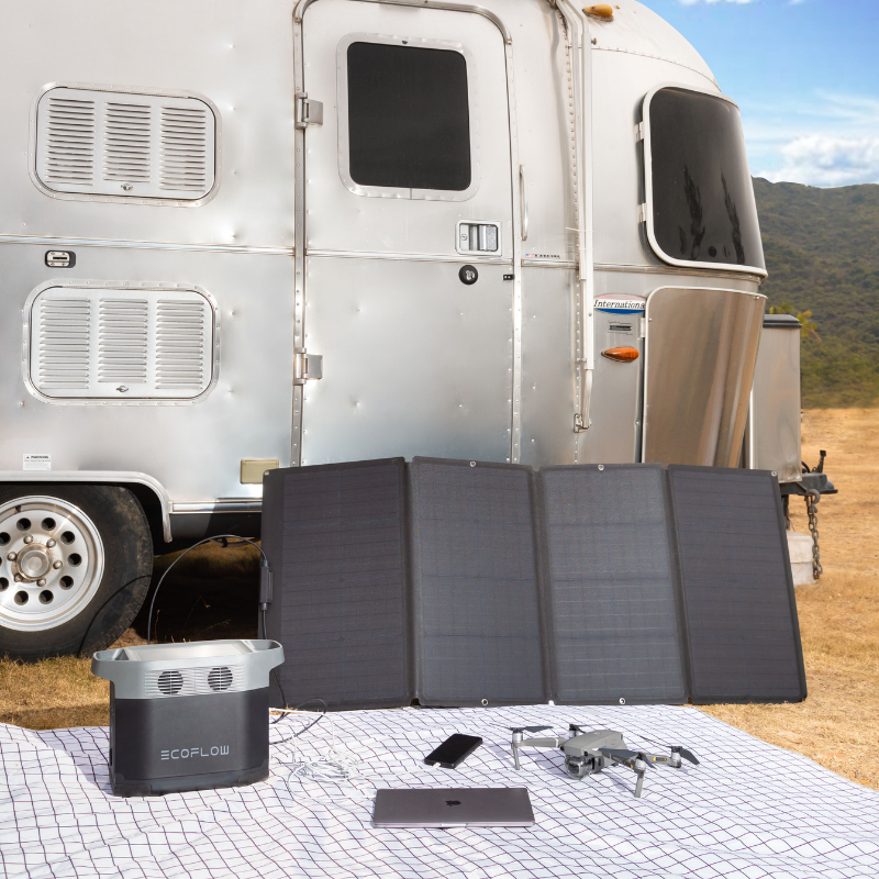 EcoFlow Portable 160W Solar Panel - EFSOLAR160W propped up next to a camper